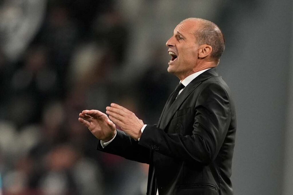 Massimiliano Allegri, allenatore del Milan, dà indicazioni dalla panchina durante una partita della stagione 2025/2026.