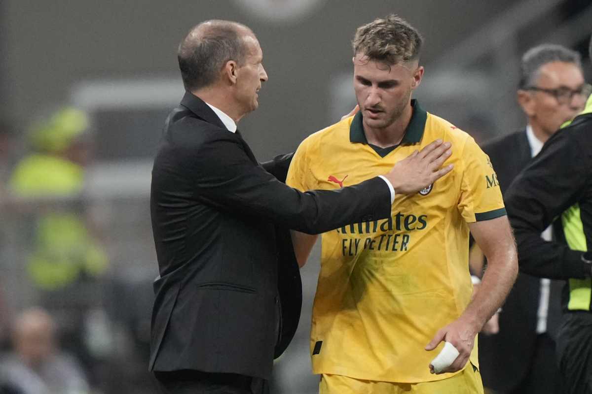 Massimiliano Allegri, allenatore del Milan, conforta Santiago Gimenez, dopo una difficile partita di Serie A 2025/26.